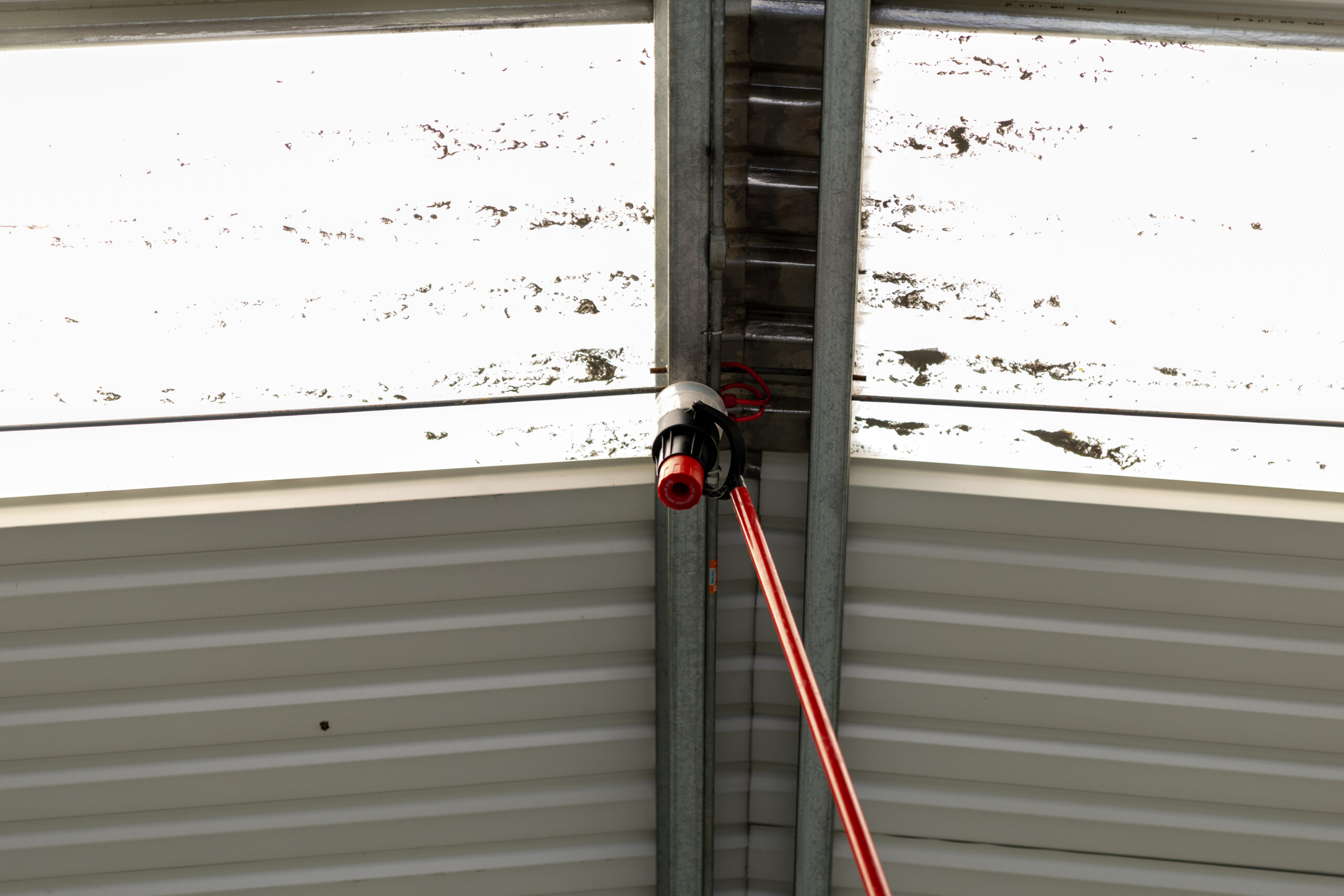 Engineer performing commercial fire alarm maintenance